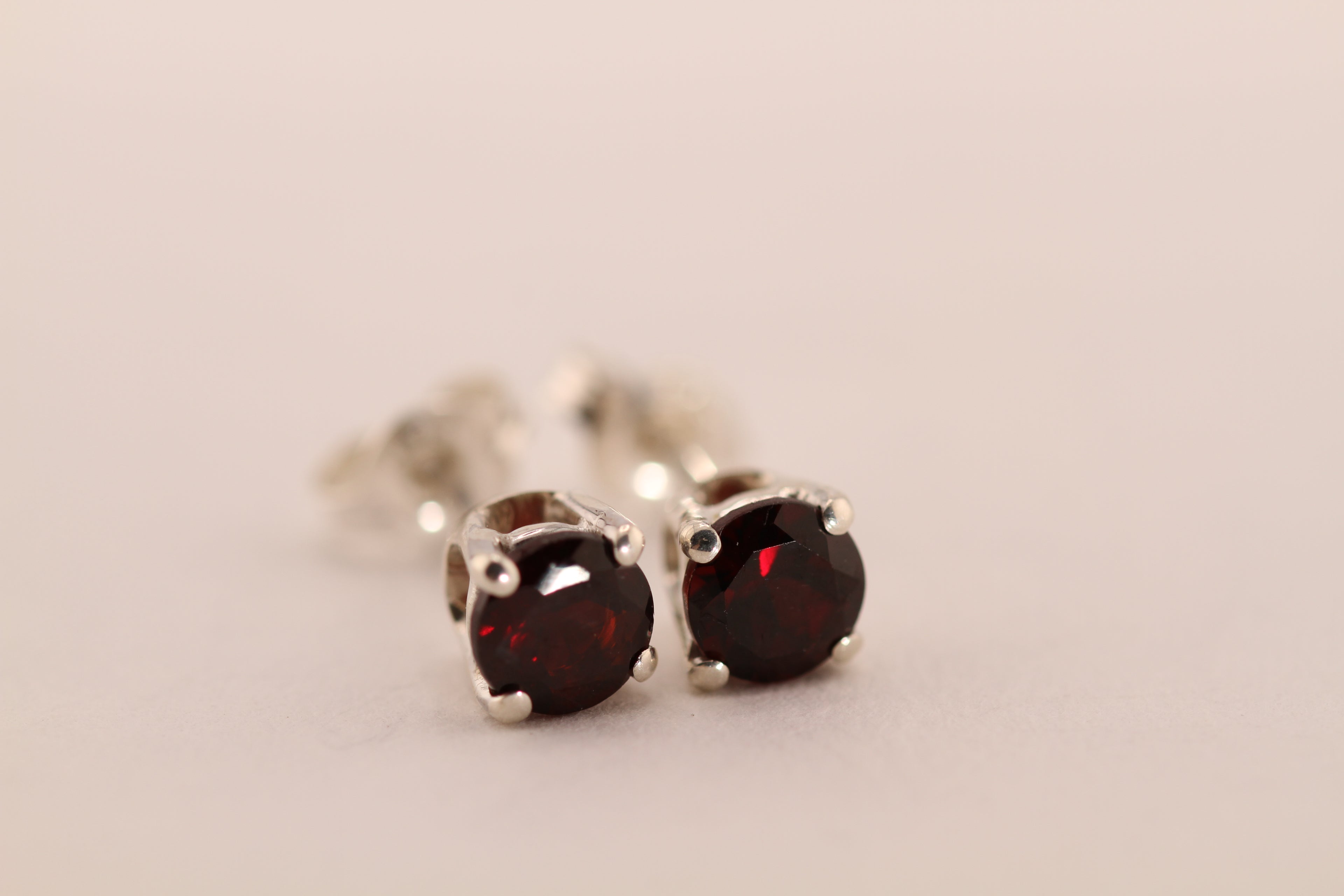Sterling Silver with dark red Garnet stud earrings