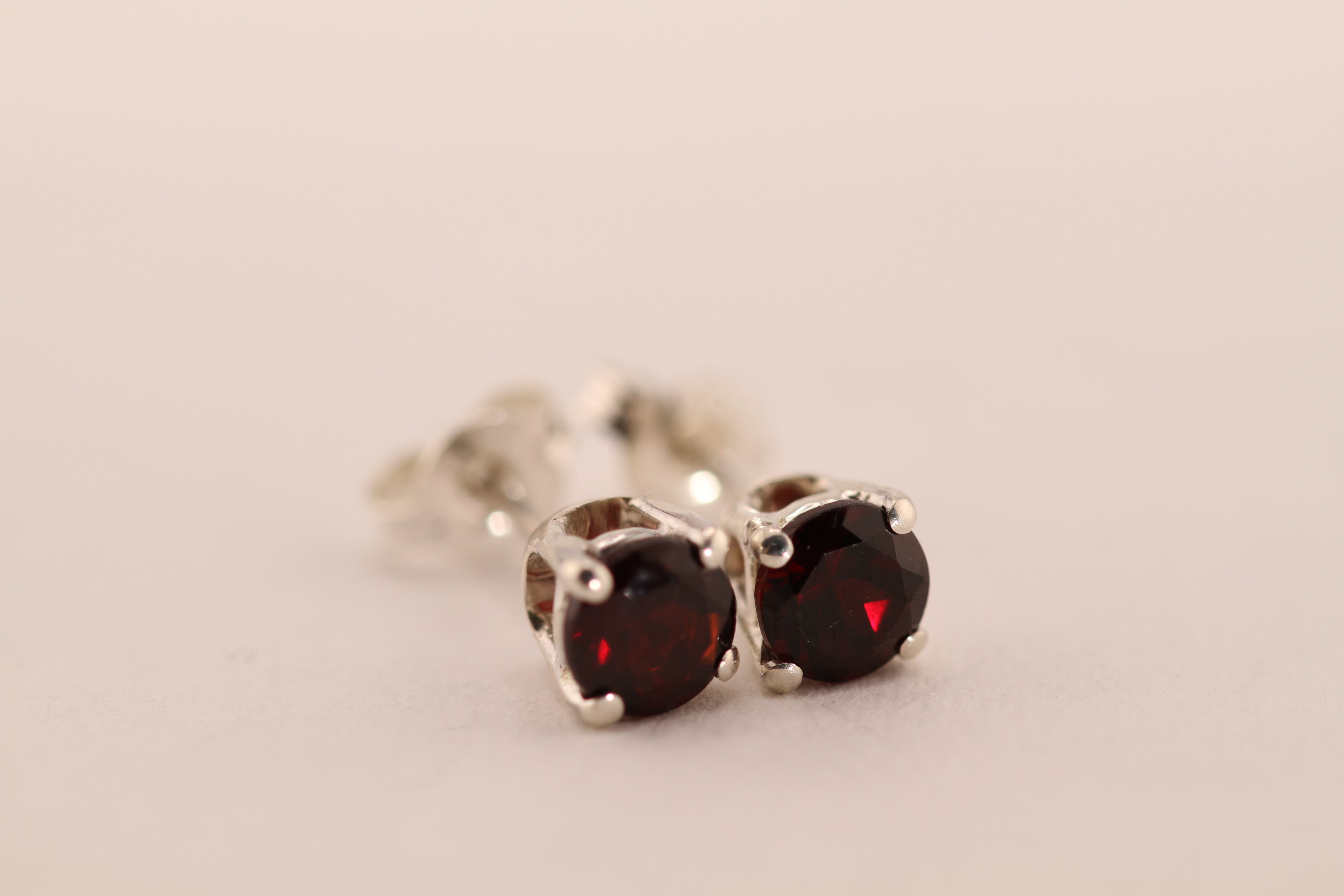 Sterling Silver with dark red Garnet stud earrings