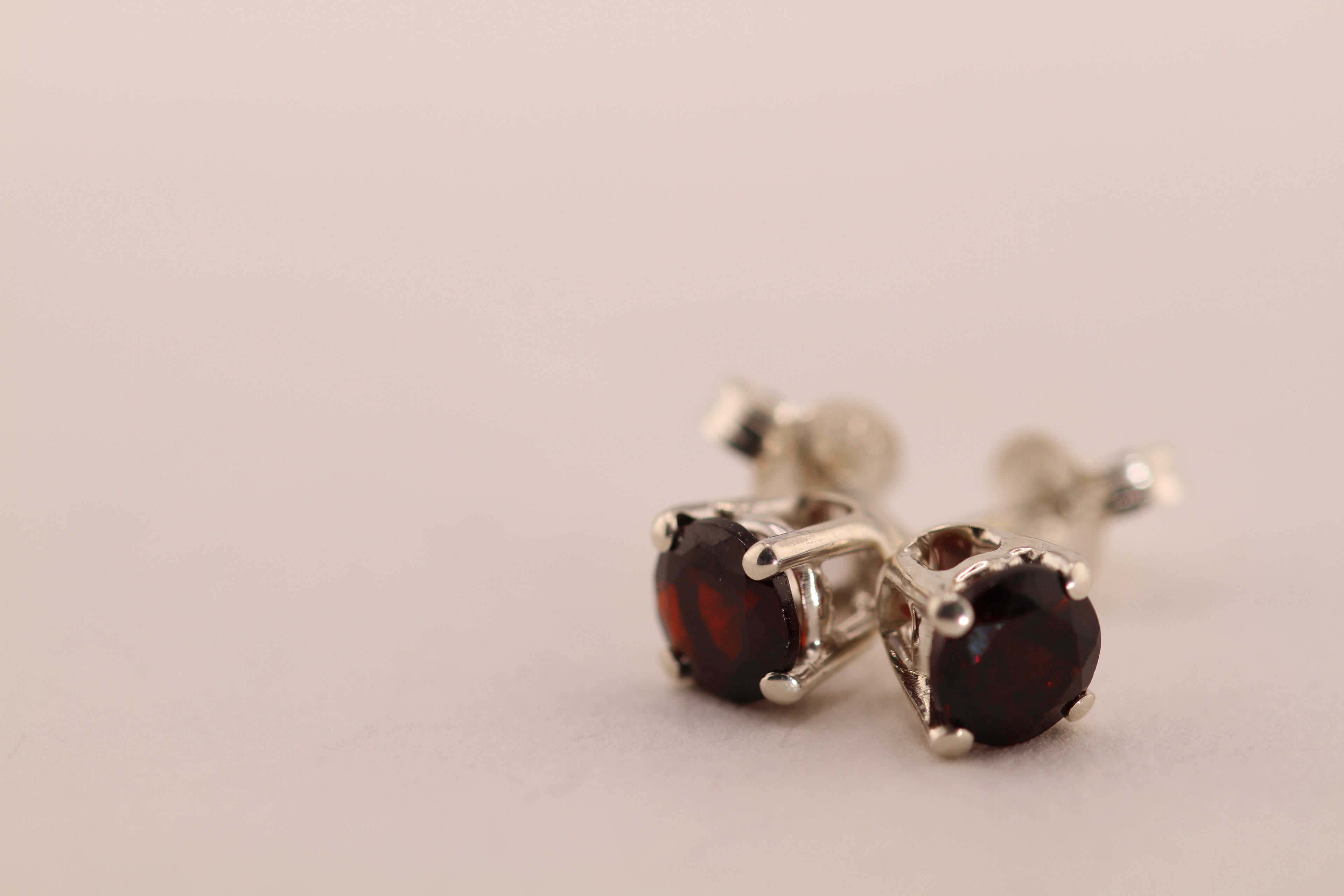 Sterling Silver with dark red Garnet stud earrings