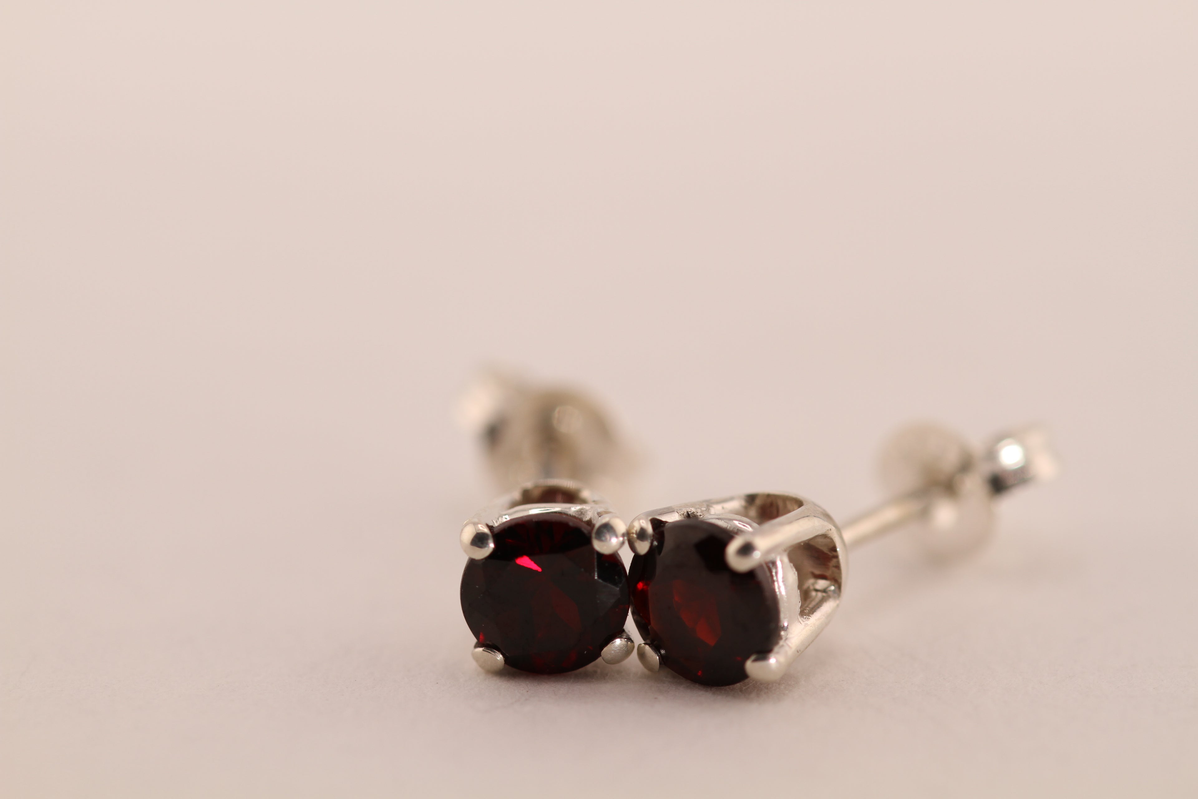 Sterling Silver with dark red Garnet stud earrings