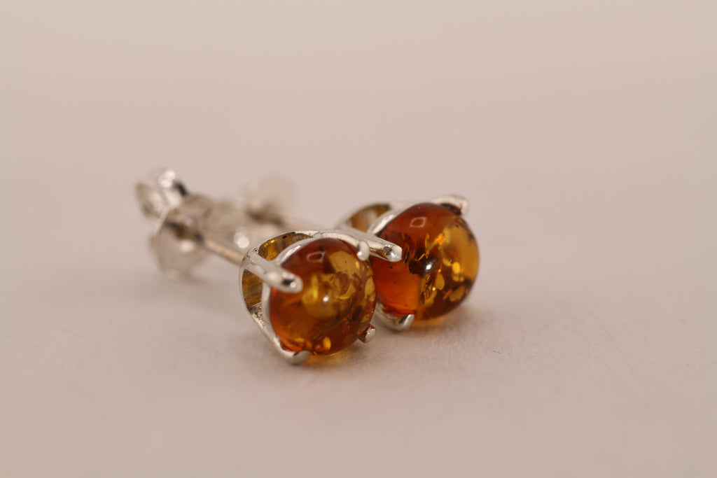 Sterling Silver stud earrings with natural Amber