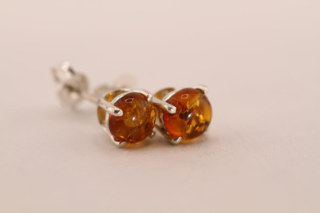 Sterling Silver stud earrings with natural Amber