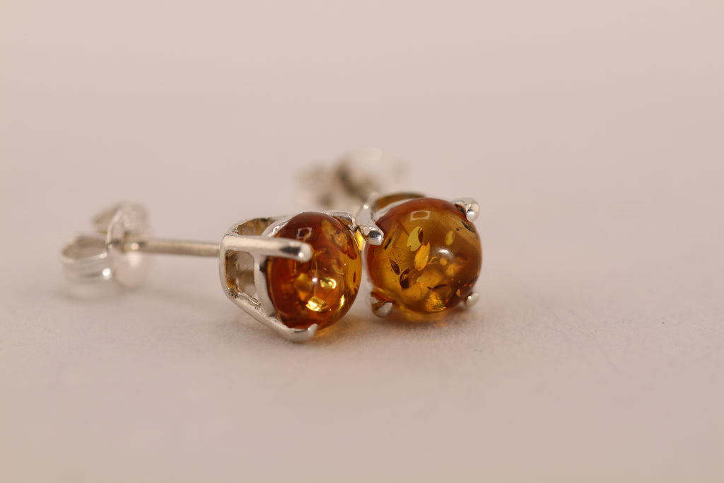 Sterling Silver stud earrings with natural Amber