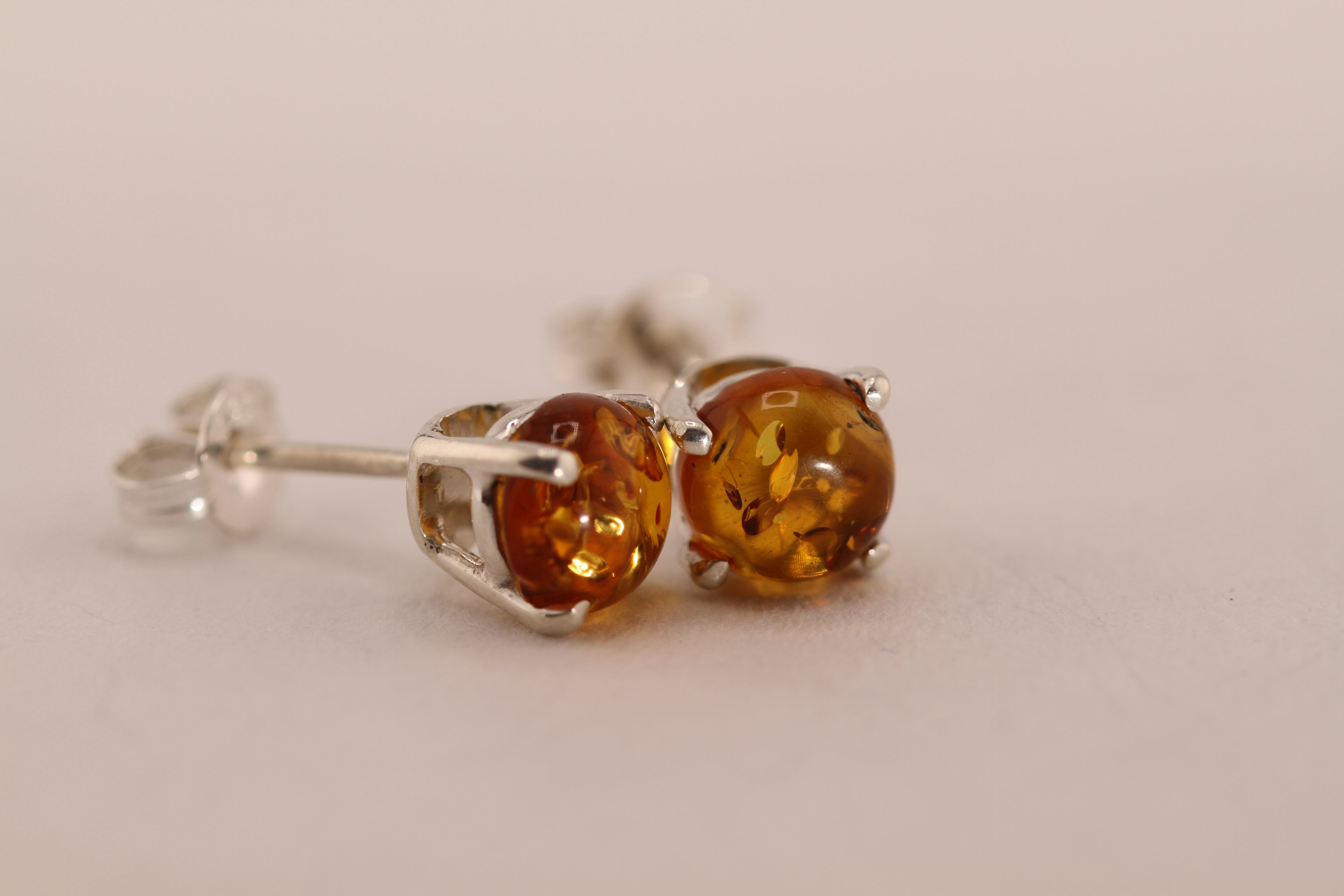 Sterling Silver stud earrings with natural Amber